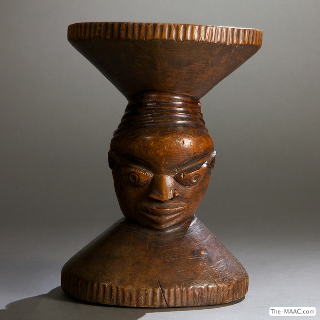 Stool with Two Faces. Wood, Congo.  H:  10″  W:  8″