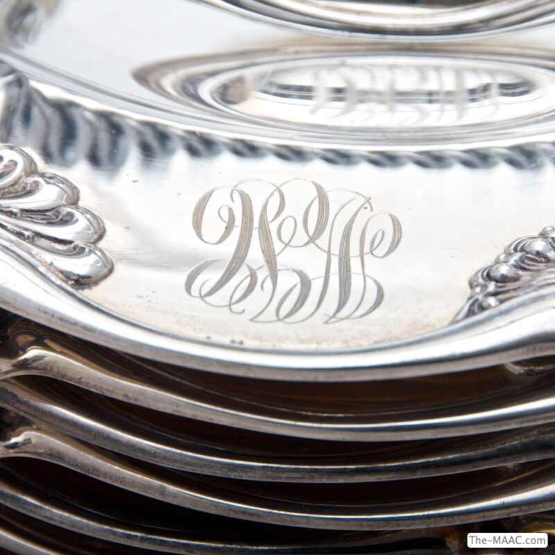 Set of 12 American Repousse Silver Plates