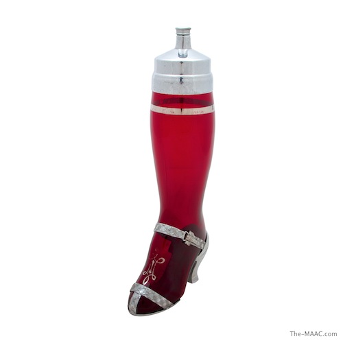   Rare “Red Leg” cocktail shaker, glass with chrome shoe, England, circa 1920-1935.  Height: 16″ high   Length from toe to heel: 7″