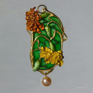 An exceptional Art Nouveau plique a jour enamel and gold pendant with a natural pearl drop. This pendant was exhibited at the Paris Exhibition of 1900 and is illustrated in the Books of Paris Exhibitions by Alastair Duncan. 18ct gold, plique a jour enamel and natural pearl, France, circa 1898-1899.