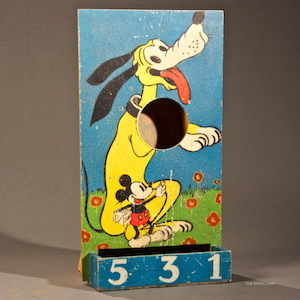 Large wooden “passe-boule” game, one of the first toys featuring Mickey Mouse and Pluto. Wood, France, 1930.