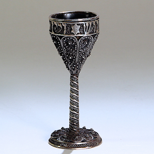 An early Bezalel kiddush goblet, circa 1906, at Menorah Galleries.
