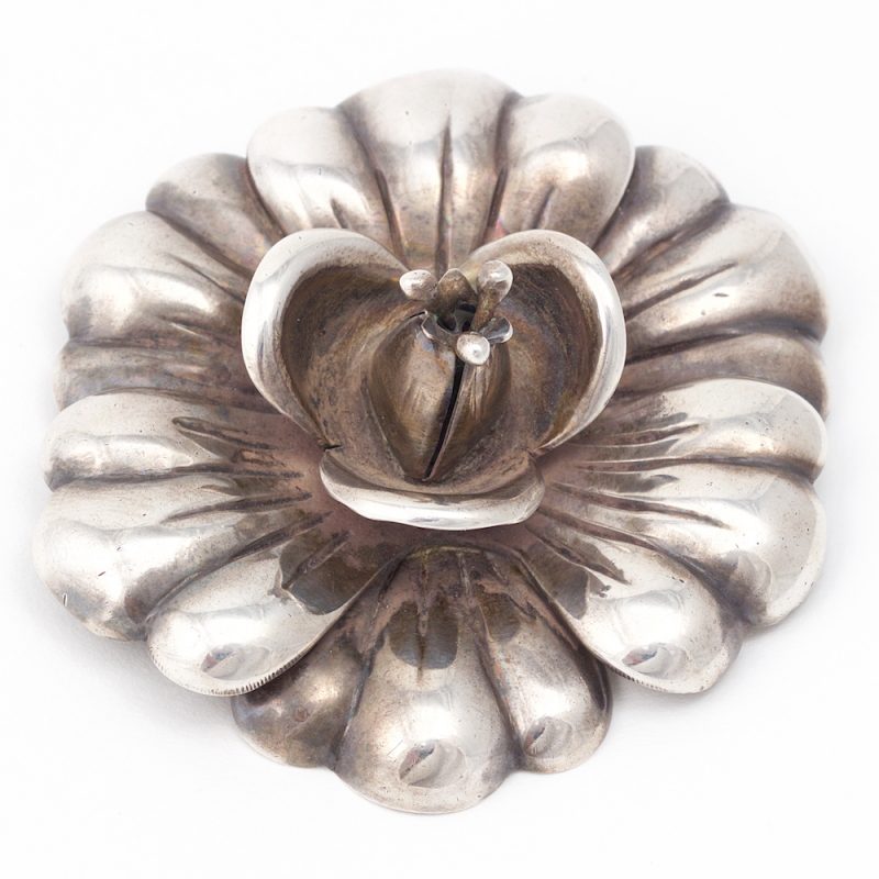 Brooches: Hector Aguilar brooch of an exotic flower in sterling silver. Aguilar and Taxco marks. Sterling silver, Mexico, 1930’s.