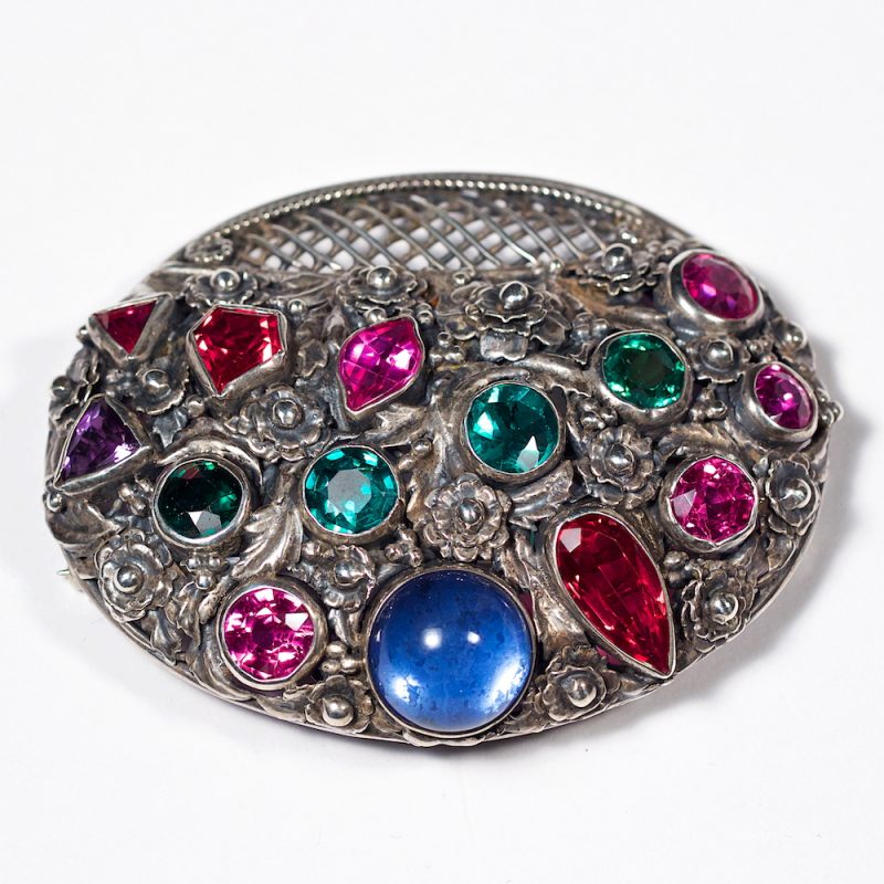 Brooches: Hobe sterling silver brooch set with colorful crystal stones. Marked Hobe Sterling. Sterling silver and crystal, USA, 1930’s.