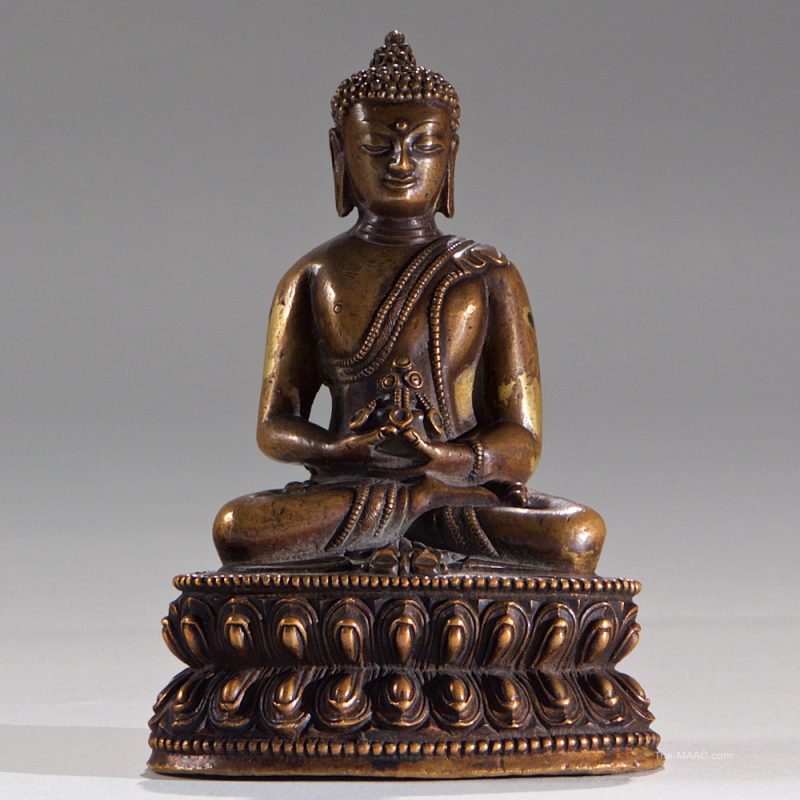 A Tibetan Bronze Buddha on Lotus Base