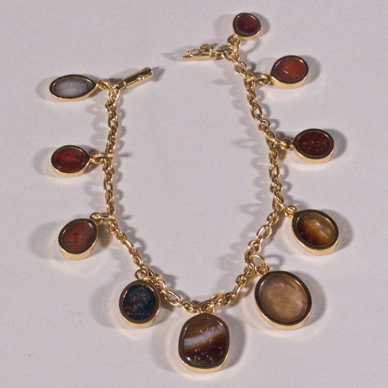 Gold Bracelet with Ten Antique Hardstone Intaglios