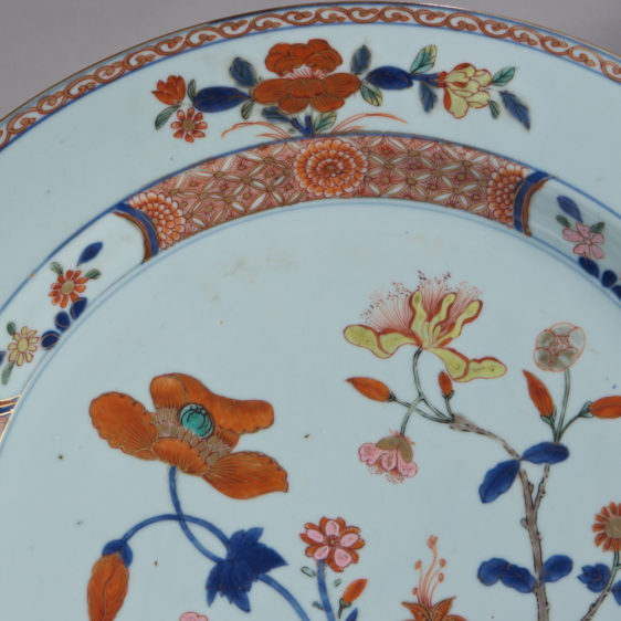 white plate with orange flowers
