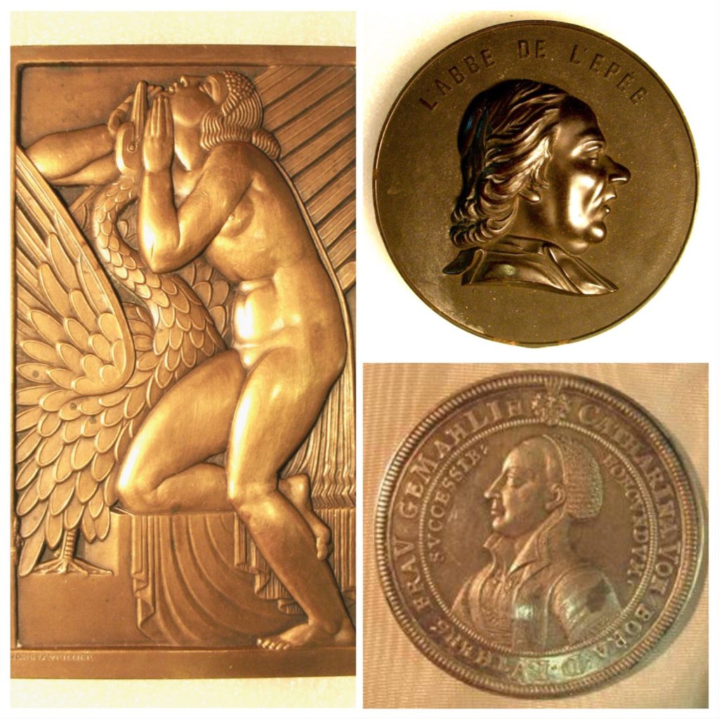 An Art Deco Medal, a plaque of Abbé Charles-Michel de l'Épée and a coin of Martin Luther 