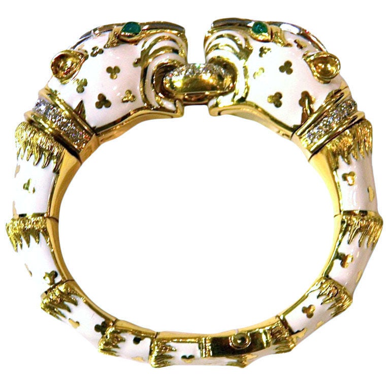 Bracelet with yellow gold, platinum and white enamel tiger heads 