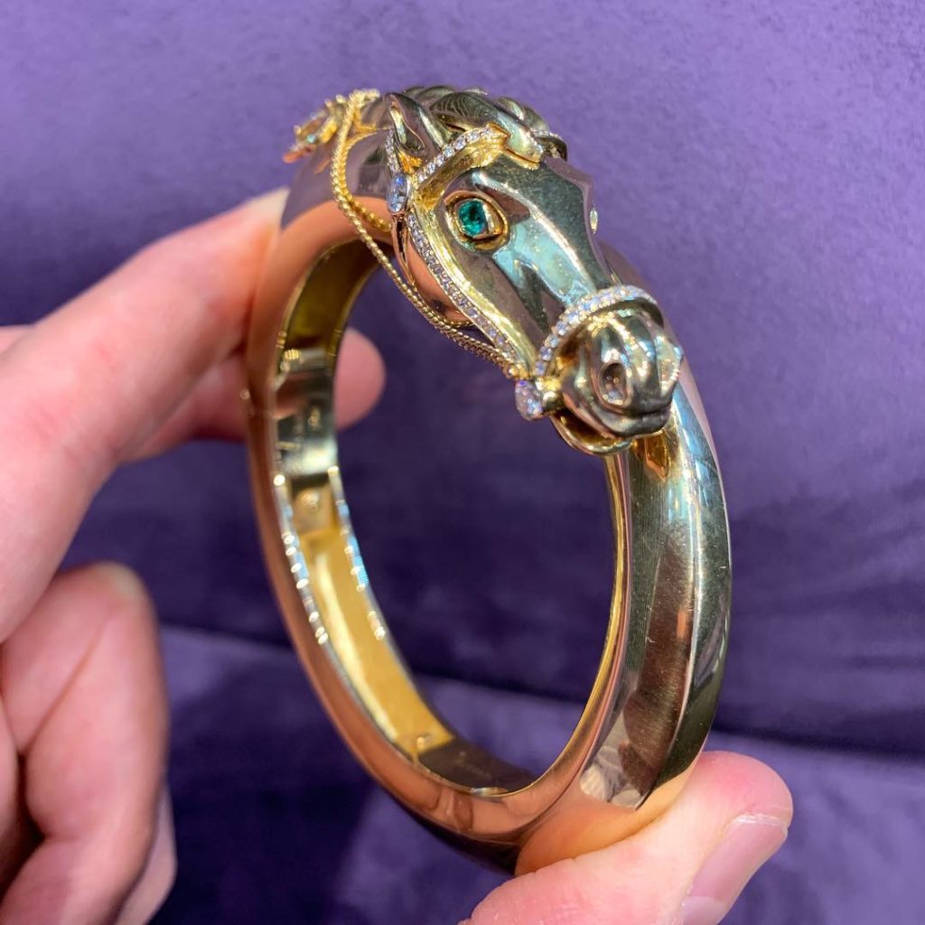 gold bracelet with horse head by Cartier 