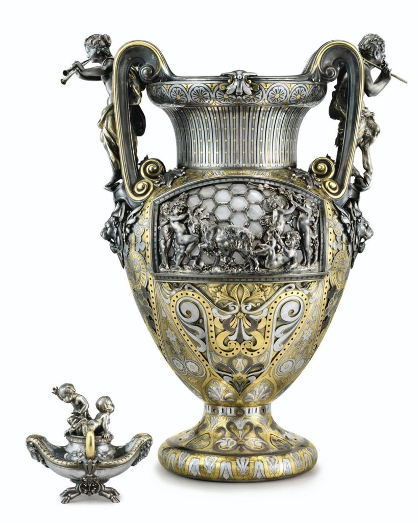Silver and gold intricately decorated vase