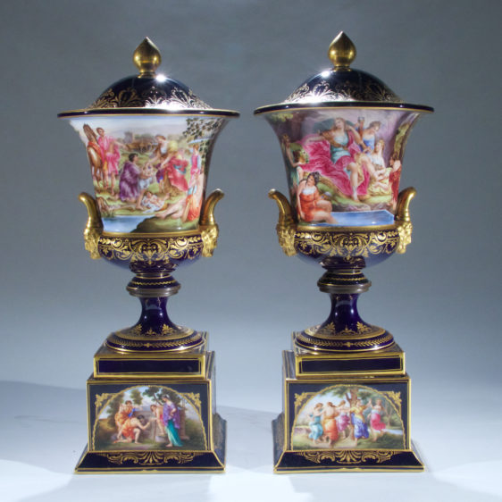 Fine Quality Pair of Vienna Porcelain Urns and Cover with Mask Handles