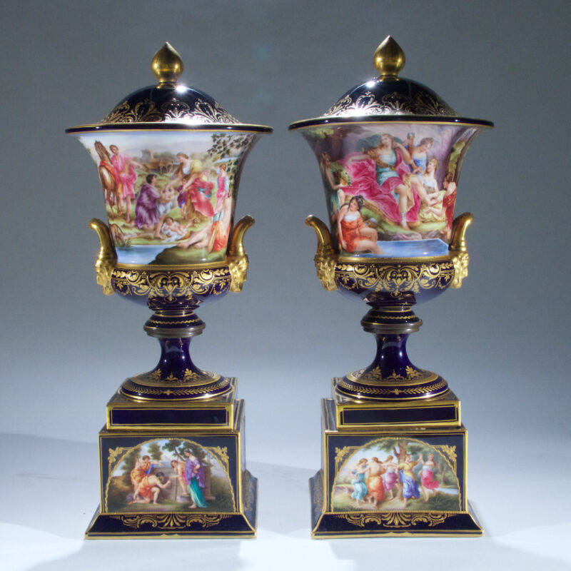 Fine Quality Pair of Vienna Porcelain Urns and Cover with Mask Handles