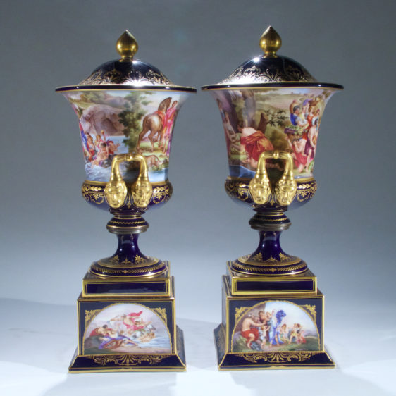 Fine Quality Pair of Vienna Porcelain Urns and Cover with Mask Handles