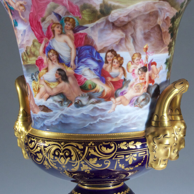 Fine Quality Pair of Vienna Porcelain Urns and Cover with Mask Handles