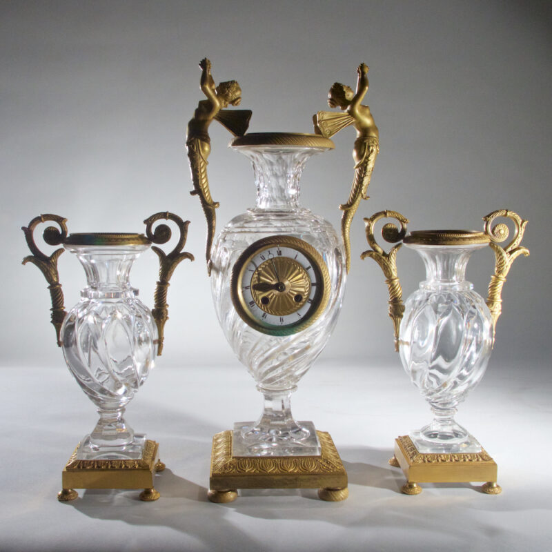 An Elegant French Ormolu and Glass Clock Garniture