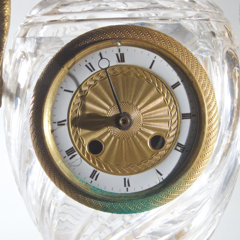 An Elegant French Ormolu and Glass Clock Garniture