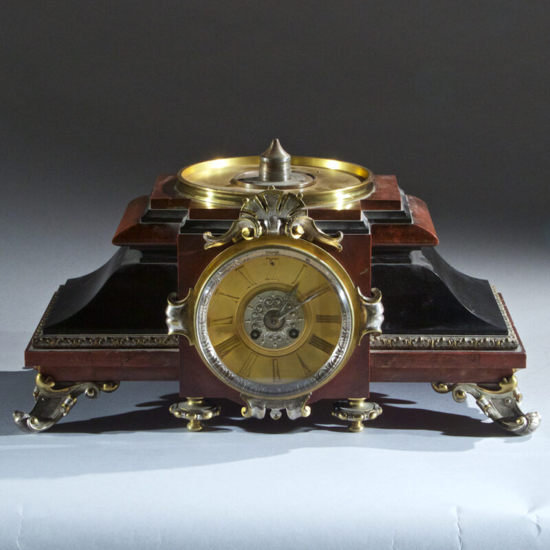 Very Fine Quality French Silvered Bronze and Rouge Marble Figural Clock