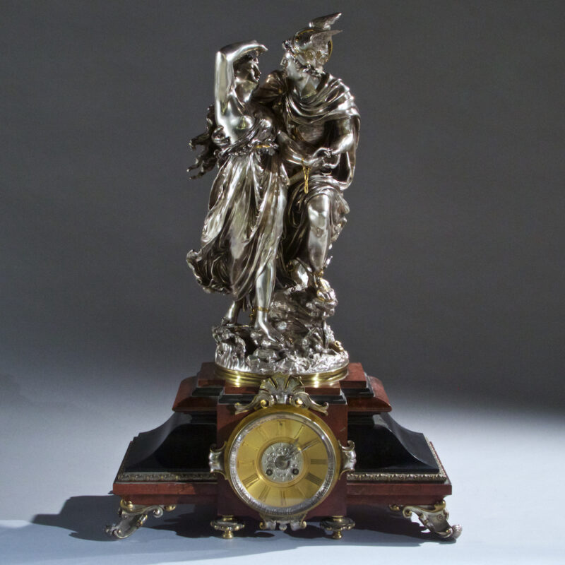 Very Fine Quality French Silvered Bronze and Rouge Marble Figural Clock