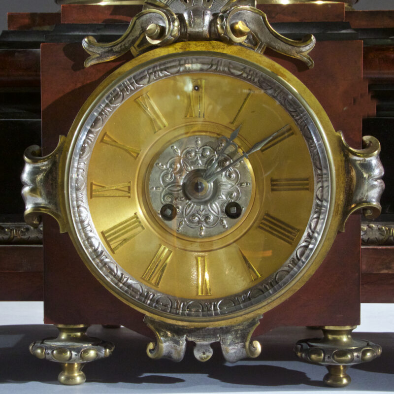 Very Fine Quality French Silvered Bronze and Rouge Marble Figural Clock