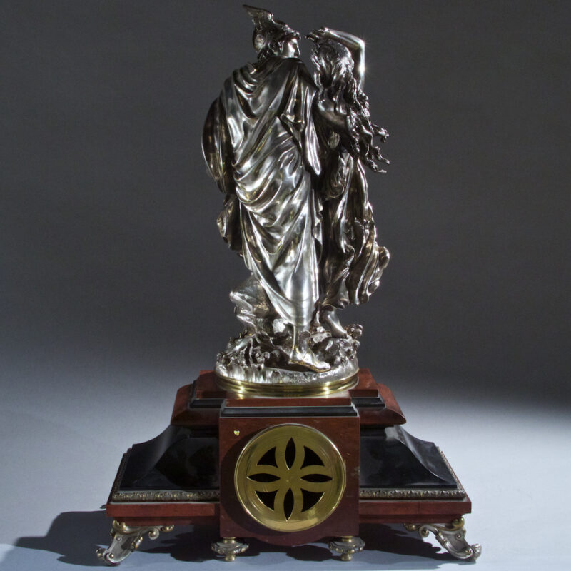 Very Fine Quality French Silvered Bronze and Rouge Marble Figural Clock