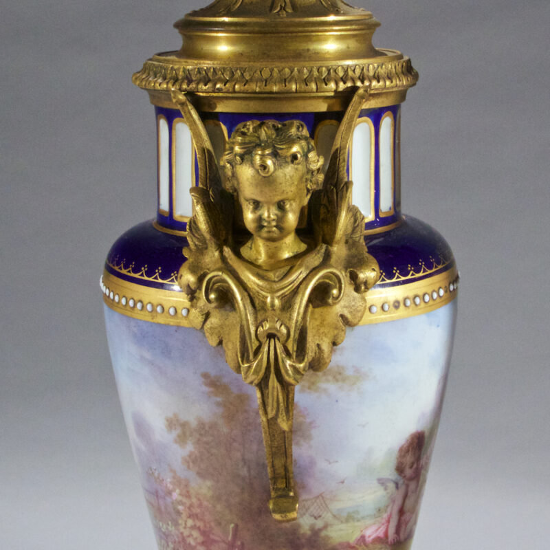 High Quality Sevres-Style Ormolu Mounted Porcelain and Cobalt Blue Ground Three Piece Garniture