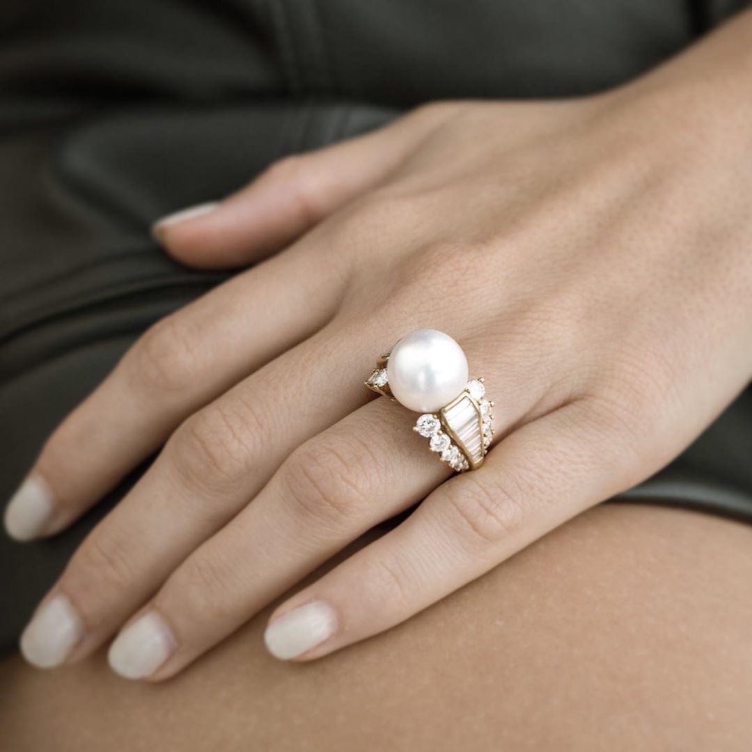 Hand Wearing Vintage Diamond and Pearl Ring.