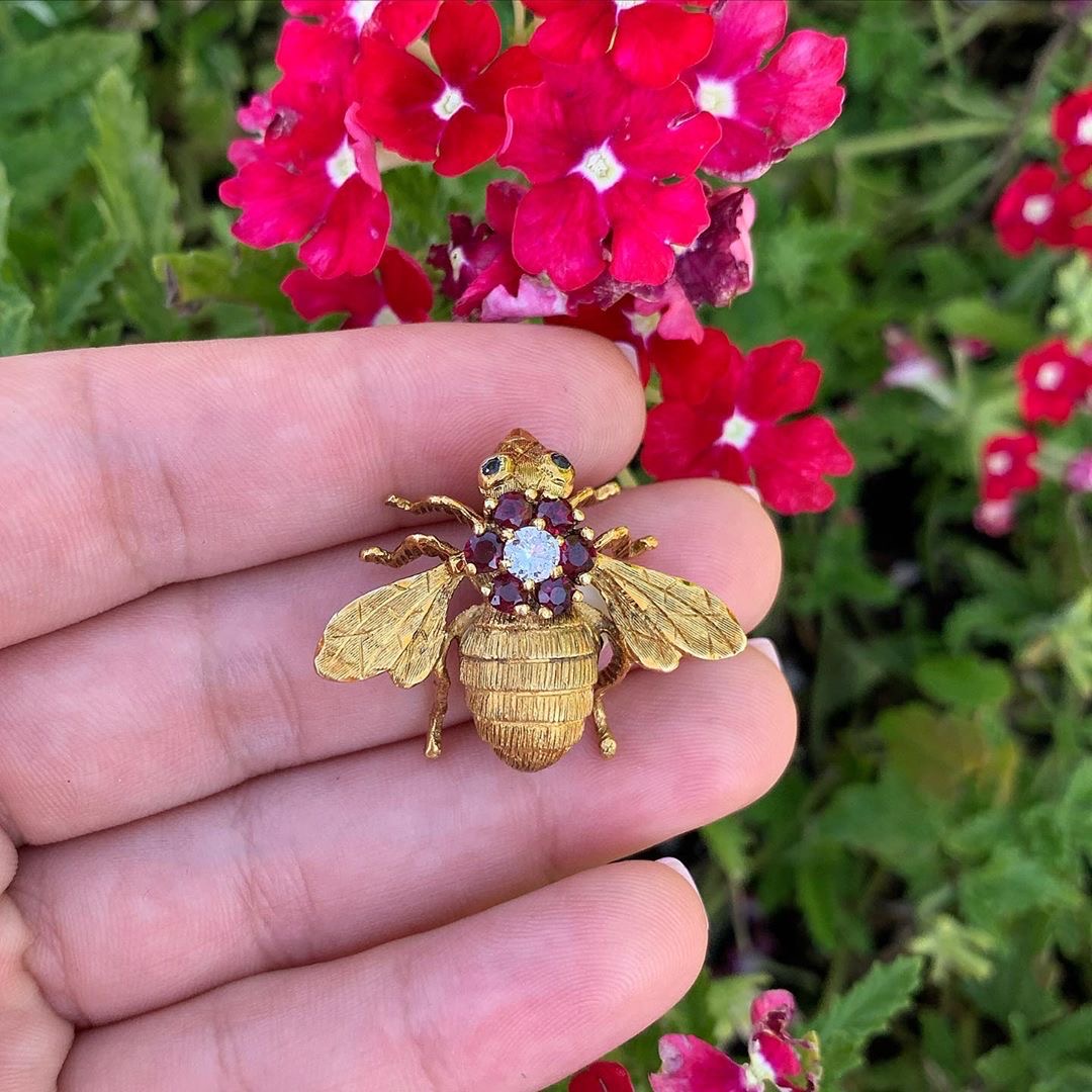 Beautiful 18k Bee Pin with Rubies, a center Diamond, and Emerald eyes